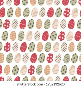 Vector seamless pattern. Colorful Easter eggs decorated with patterns. Great for fabrics, wrapping papers, covers. White background. Beige, green and red colors.