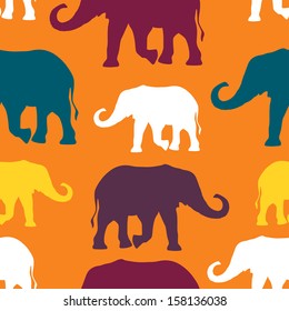 Vector seamless pattern with colorful elephants. Can be used for textile, website background, book cover, packaging 