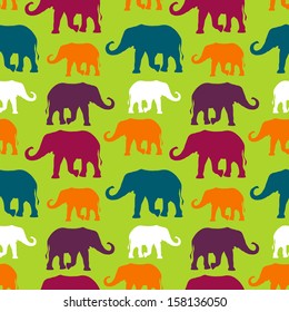 Vector seamless pattern with colorful elephants. Can be used for textile, website background, book cover, packaging 