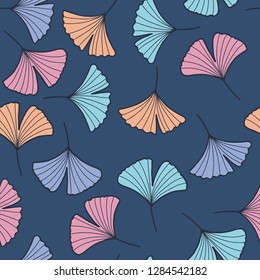 Vector seamless pattern with colorful Gingko or Ginkgo biloba leaves on the blue background.