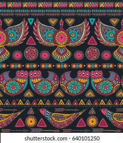 Vector seamless pattern with colorful hand drawn ethnic elements. Tribal design with geometric forms and ornate birds. Folk motif for print, web, textile, wrapping paper.