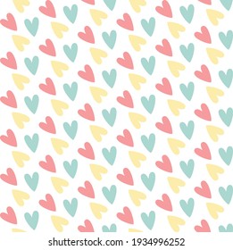 Vector seamless pattern with colorful hearts on a white background. For baby and child prints, fabric, wrapping. Baby shower backdrop 