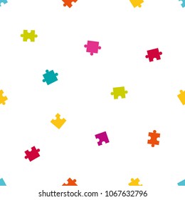 Vector seamless pattern of colorful jigsaw puzzle pieces.