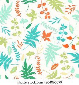 Vector seamless pattern with colorful leaves on white background. 