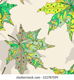 Vector seamless pattern with colorful maple leaves.