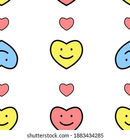 Vector seamless pattern consisting of multicolored smiling hearts.