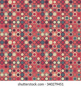 Vector seamless pattern. Consists of geometric elements arranged on red background.The elements have a round shape and different color.