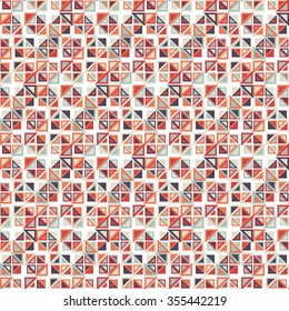 Vector seamless pattern. Consists of geometric elements on a white background. The elements have a triangular shape and different color.