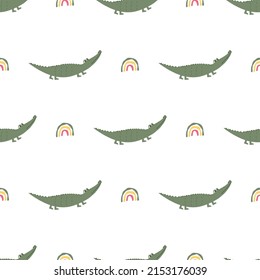 Vector seamless pattern with crocodiles and rainbows