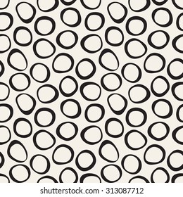 Vector seamless pattern with curved circles. Modern stylish texture. Hand drawn abstract background.