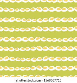 Vector seamless pattern of cut boiled eggs stripes with green background. Perfect for fabric, scrapbooking and wallpaper projects.