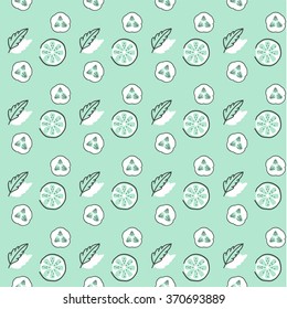 Vector seamless pattern the cut slices of lime, cucumber and mint. 