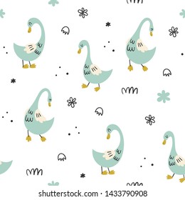 Vector seamless pattern with cute cartoon ducks. Character bird
