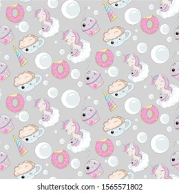 Vector seamless pattern with cute cartoon unicorn and donuts.  Magic background with little unicorns surrounds a cloud of bubbles. Seamless pattern transparent background.