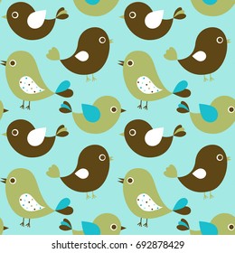 Vector seamless pattern with cute cartoon birds in brown and green colors on blue background for textile design