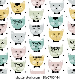 Vector seamless pattern with cute cats. Childish seamless pattern with adorable cat faces on isolated background. Perfect for kids design, fabric, wrapping, wallpaper, textile, apparel.