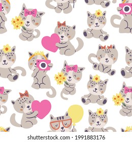 Vector seamless pattern with cute cats isolated on white background. Nursery pattern design for boys and girls. Cute little cats pattern. Simple minimalistic kids pattern