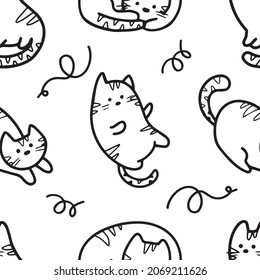 Vector seamless pattern with cute cats in doodle style.