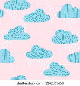 Vector seamless pattern with cute clouds and raindrops. Great for wrapping paper, textiles, children's clothing, wallpaper, etc.