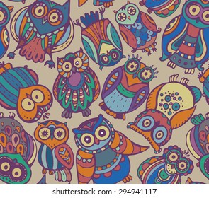 Vector seamless pattern with cute colorful owls. Hand drawn graphic design.