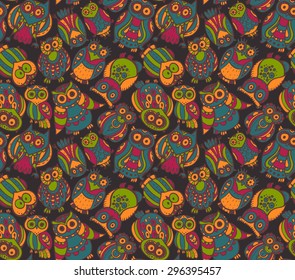 Vector seamless pattern with cute colorful owls. Hand drawn graphic design