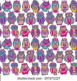 Vector seamless pattern with cute colorful owls. Hand drawn graphic design.