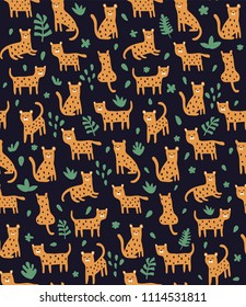 vector seamless pattern, cute leopards on dark background and tropical eaves