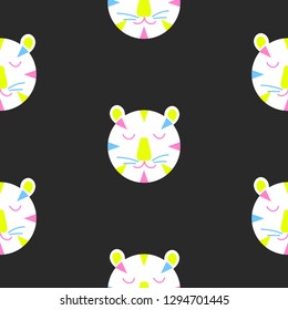 Vector seamless pattern with cute lion heads on black background. Fabric design for kids clothing. Black and white cartoon style wild cats wallpaper print.