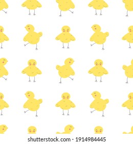 Vector seamless pattern with cute little yellow chickens on a white background.