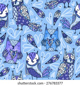 vector  seamless pattern with cute owls on a blue background