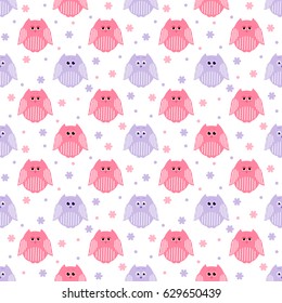 Vector seamless pattern of cute pink and violet owls with flowers and dots in the background