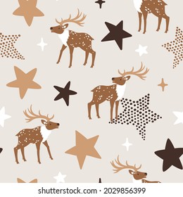 Vector seamless pattern with cute reindeers and stars. Winter repeated texture with deers. Childish print with cartoon characters for kids fabric and wrapping paper. Scandinavian style.