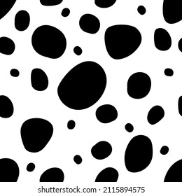 Vector seamless pattern with dalmatian fur texture. Irregular oval and round black spots on white backdrop 