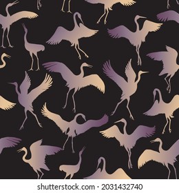 Vector seamless pattern of Dancing Japanese crane birds. Gold and purple hand drawn silhouette sketches on a black background