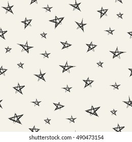 Vector seamless pattern. Dark star on a beige background