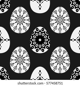 Vector seamless pattern with decorative eggs. Easter background in black and white colors.