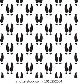 Vector seamless pattern with deer footprints
