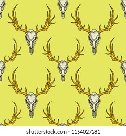 Vector seamless pattern with deer skulls illustrations in engraving technique.