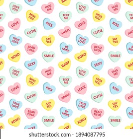 Vector seamless pattern of different color flat cartoon Valentine’s sweet candy with love text isolated on white background
