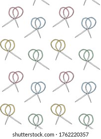 Vector seamless pattern of different colored hand drawn doodle sketch knitting needles isolated on white background