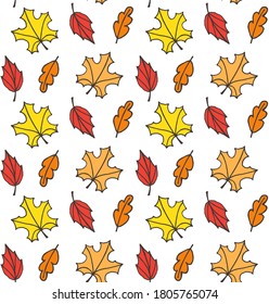 Vector seamless pattern of different colored hand drawn doodle sketch autumn leaves isolated on white background