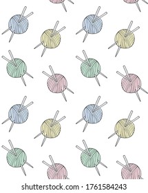 Vector seamless pattern of different pastel colored hand drawn doodle sketch knitting threads and needles isolated on white background
