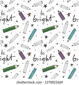 Vector seamless pattern with different pencils and lettering,  in bright colors on a white background, great for printing or textile design.Hand drawn,sketch
