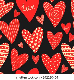 Vector seamless pattern with different red hearts on the dark background