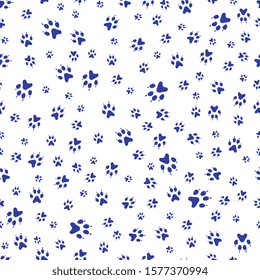 Vector seamless pattern with dog paw tracks. Animal background. Pet footprints backdrop. Design for textile, wrapping, print.