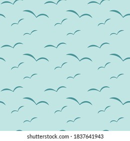 Vector seamless pattern. Doodle birds silhouettes. Isolated on blue background