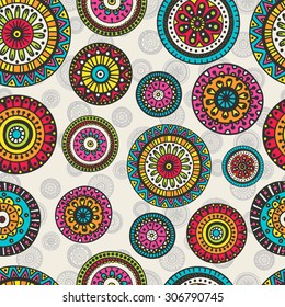 Vector seamless pattern with doodle circles. Hand drawn rounds with floral ornament. Bright colors: pink, red, green, white, yellow, blue and orange.