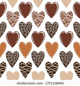 Vector seamless pattern with doodle decorated hearts of different color chocolate on white background. Cute backdrop for print, textile, Valentine’s day, sweet shop, cover, wallpaper. 