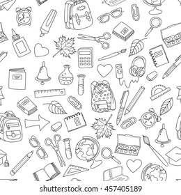 Vector seamless pattern with doodle school tools. Hand drawn outline school icons, isolated on white. Design for fashion print, wrapping, web backgrounds, school or education theme.