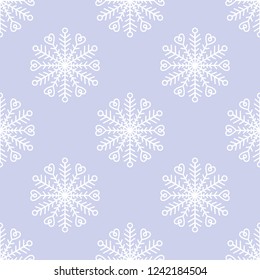 Vector seamless pattern with doodle snowflakes. Hand drawn winter background.